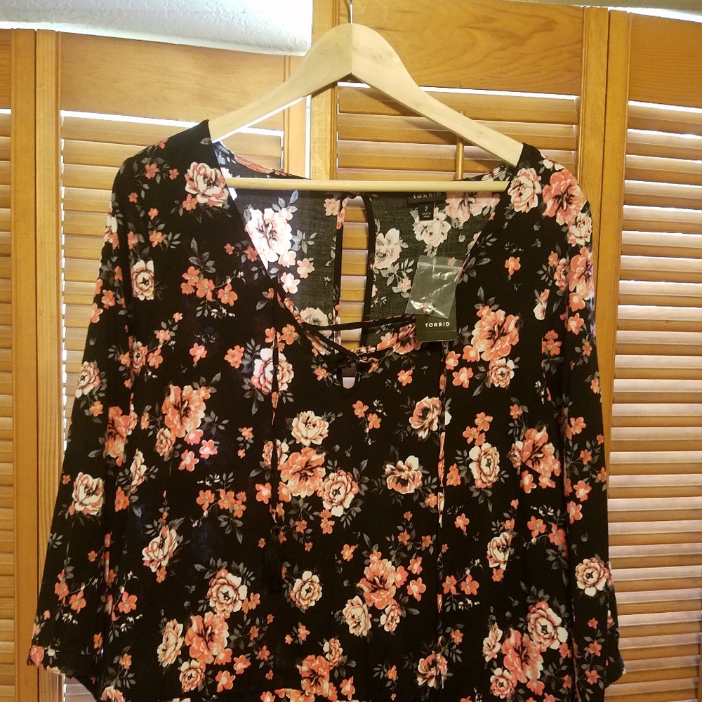 Very cute black and pink romper.